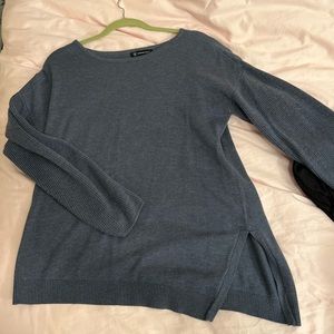 Asymmetrical sweater with side slit